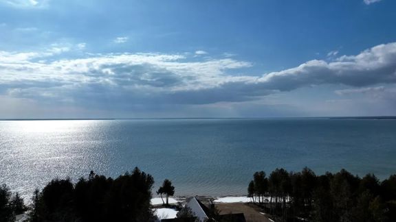 Custom Lakefront Log Home in Hessel, Michigan for 